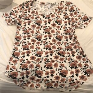 NWT never worn Iris size Large. Beautiful rose print and color!